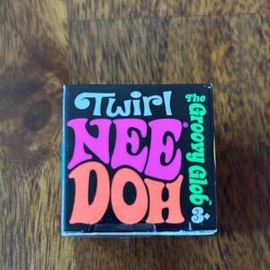 VIRAL Twirl NEE DOH The Groovy Glob - Black Box with Pink & Orange Logo